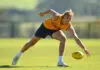 MELBOURNE, AUSTRALIA - APRIL 28: Aidan Schubert of the Hawks gathers the ball during a Hawthorn Hawks AFL training session at Kennedy Community Centre on April 28, 2026 in Melbourne, Australia. (Photo by Quinn Rooney/Getty Images)