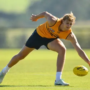 MELBOURNE, AUSTRALIA - APRIL 28: Aidan Schubert of the Hawks gathers the ball during a Hawthorn Hawks AFL training session at Kennedy Community Centre on April 28, 2026 in Melbourne, Australia. (Photo by Quinn Rooney/Getty Images)