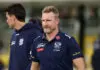 Nathan Buckley reacts to Tasmania coaching call, comments on future aspirations MELBOURNE, AUSTRALIA - MAY 09: Nathan Buckley, assistant coach of the Cats walks to the huddle during the round nine AFL match between Geelong Cats and Collingwood Magpies at Melbourne Cricket Ground, on May 09, 2026, in Melbourne, Australia. (Photo by Morgan Hancock/AFL Photos/via Getty Images)