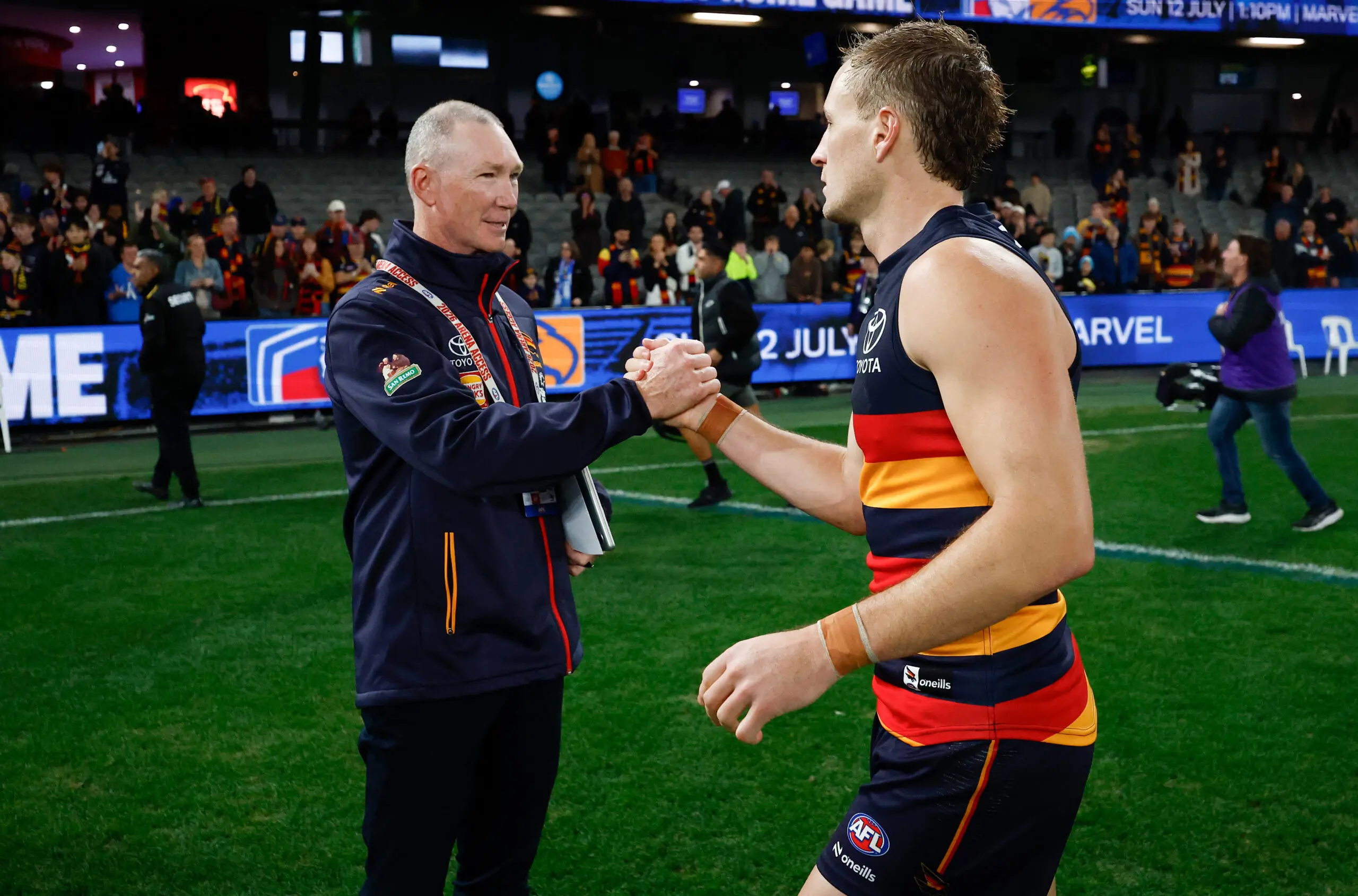 MELBOURNE, AUSTRALIA - JUNE 11: Murray Davis, Assistant Coach of the Crows and Jordan Dawson of the Crows celebrate during the 2026 AFL Round 14 match between the Western Bulldogs and the Adelaide Crows at Marvel Stadium on June 11, 2026 in Melbourne, Australia. (Photo by Michael Willson/AFL Photos via Getty Images)