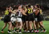 MELBOURNE, AUSTRALIA - JULY 04: Jasper Alger of the Tigers and Sam Walsh of the Blues start some push and shove during the 2026 AFL Round 17 match between the Richmond Tigers and the Carlton Blues at the Melbourne Cricket Ground on July 4, 2026 in Melbourne, Australia. (Photo by James Wiltshire/AFL Photos via Getty Images)