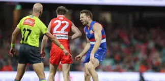 “Couldn’t breathe”: Western Bulldogs coach slams AFL over forward’s staging fne SYDNEY, AUSTRALIA - JULY 03: Nick Blakey of the Swans clashes with Will Lewis of the Bulldogs during the round 17 AFL match between Sydney Swans and Western Bulldogs at Sydney Cricket Ground, on July 03, 2026, in Sydney, Australia. (Photo by Mark Metcalfe/AFL Photos/via Getty Images)