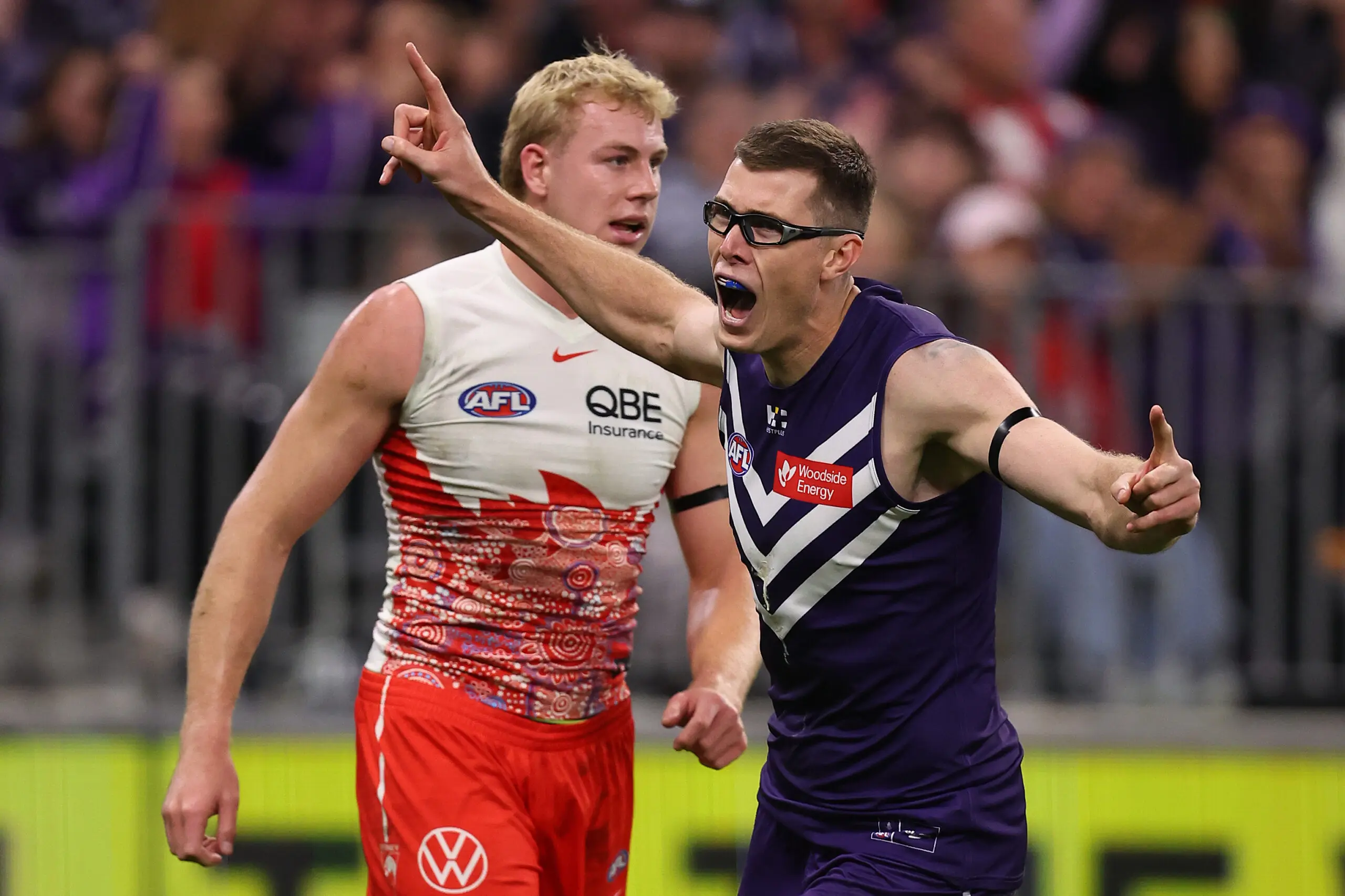 PERTH, AUSTRALIA - JULY 09: Mason Cox of the Dockers celebrates a goal during the round 18 AFL match between Fremantle Dockers and Sydney Swans at Optus Stadium, on July 09, 2026, in Perth, Australia. (Photo by Paul Kane/Getty Images)