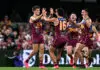 BRISBANE, AUSTRALIA - JULY 12: Zac Bailey of the Lions celebrates with team mates after kicking a goal during the round 18 AFL match between Brisbane Lions and Essendon Bombers at The Gabba, on July 12, 2026, in Brisbane, Australia. (Photo by Bradley Kanaris/Getty Images)