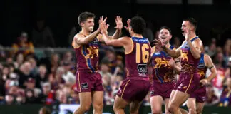 Brisbane coach coy on star’s future call BRISBANE, AUSTRALIA - JULY 12: Zac Bailey of the Lions celebrates with team mates after kicking a goal during the round 18 AFL match between Brisbane Lions and Essendon Bombers at The Gabba, on July 12, 2026, in Brisbane, Australia. (Photo by Bradley Kanaris/Getty Images)