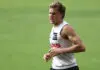 The “prank call” that delivered Gold Coast’s next AFL debutant GOLD COAST, AUSTRALIA - JULY 17: Caleb Lewis during a Gold Coast Suns Training Session at People First Stadium on July 17, 2026 in Gold Coast, Australia. (Photo by Chris Hyde/Getty Images)