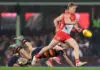 Dean Cox provides injury update on superstar Swan, backs forward to respond SYDNEY, AUSTRALIA - JULY 17: Isaac Heeney of the Swans kicks during the round 19 AFL match between Sydney Swans and Adelaide Crows at Sydney Cricket Ground, on July 17, 2026, in Sydney, Australia. (Photo by Cameron Spencer/Getty Images)