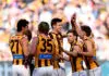 Has this Hawk’s performance just changed the 2026 AFL trade landscape? MELBOURNE, AUSTRALIA - JULY 19: Mitch Lewis of the Hawks is congratulated by team mates after kicking a goal during the round 19 AFL match between Richmond Tigers and Hawthorn Hawks at Melbourne Cricket Ground, on July 19, 2026, in Melbourne, Australia. (Photo by Josh Chadwick/Getty Images)