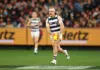 MELBOURNE, AUSTRALIA - JULY 24: Bailey Smith of the Cats runs with the ball during the round 20 AFL match between Melbourne Demons and Geelong Cats at Melbourne Cricket Ground, on July 24, 2026, in Melbourne, Australia. (Photo by Robert Cianflone/Getty Images)