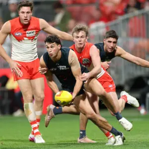 SYDNEY, AUSTRALIA - JULY 25: Finn Callaghan of the Giants handballs during the round 20 AFL match between Greater Western Sydney Giants and Sydney Swans at ENGIE Stadium, on July 25, 2026, in Sydney, Australia. (Photo by Darrian Traynor/Getty Images)