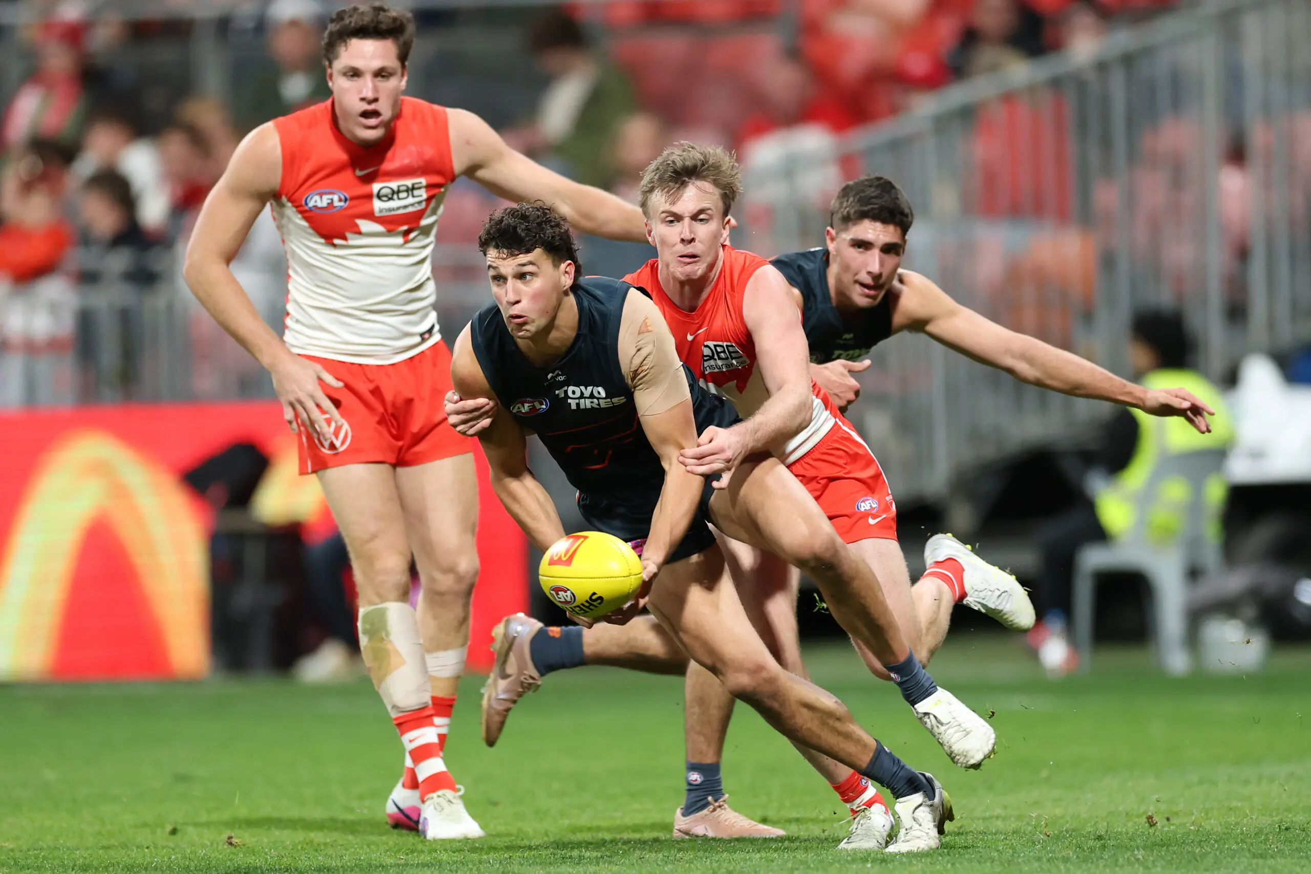 SYDNEY, AUSTRALIA - JULY 25: Finn Callaghan of the Giants handballs during the round 20 AFL match between Greater Western Sydney Giants and Sydney Swans at ENGIE Stadium, on July 25, 2026, in Sydney, Australia. (Photo by Darrian Traynor/Getty Images)