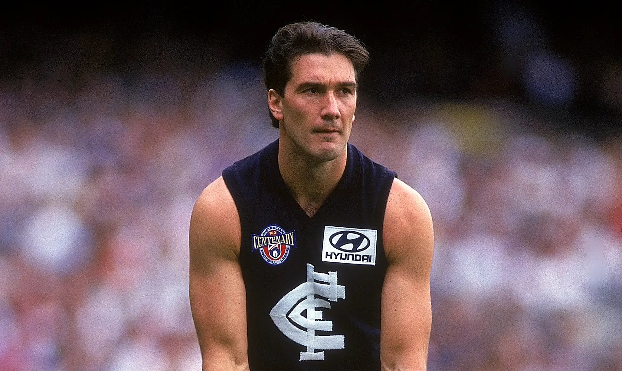 MELBOURNE, AUSTRALIA - 1996: Stephen Silvagni of the Blues in action during the round two AFL match between the Carlton Blues and Essendon Bombers held at the Melbourne Cricket Ground 1996, in Melbourne, Australia. (Photo by Tony Feder/Getty Images)