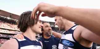 Prickly Cats coach insists there is an “arm’s length” between himself and Kolodjashnij’s concussion controversy MELBOURNE, AUSTRALIA - SEPTEMBER 24: Cats head coach Chris Scott celebrates with Gryan Miers of the Cats and Jake Kolodjashnij of the Cats after winning the 2022 AFL Grand Final match between the Geelong Cats and the Sydney Swans at the Melbourne Cricket Ground on September 24, 2022 in Melbourne, Australia. (Photo by Cameron Spencer/AFL Photos/via Getty Images)