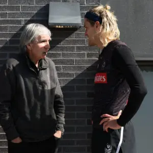 MELBOURNE, AUSTRALIA - MAY 01: Darcy Moore of the Magpies speaks with Peter McKenna during a Collingwood Magpies AFL training session at Olympic Park Oval on May 01, 2024 in Melbourne, Australia. (Photo by Robert Cianflone/Getty Images)