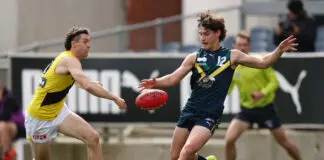 Richmond NGA prospect talks draft hopes, VFL debut and AFL aspirations MELBOURNE, AUSTRALIA - APRIL 18: Tanner Armstrong of the AFL National Academy kicks the ball during the Marsh AFL National Academy Boys match between Australia U18 and Richmond VFL at Ikon Park on April 18, 2026 in Melbourne, Australia. (Photo by Morgan Hancock/AFL Photos/via Getty Images)