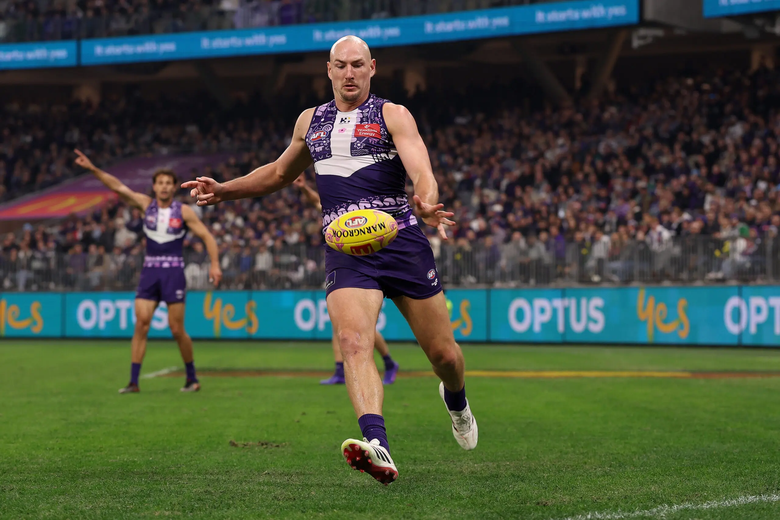 PERTH, AUSTRALIA - MAY 22: Brennan Cox of the Dockers kicks the ball during the round 11 AFL match between Walyalup (Fremantle Dockers) and Euro-Yroke (St Kilda Saints) at Optus Stadium, on May 22, 2026, in Perth, Australia. (Photo by Janelle St Pierre/AFL Photos/via Getty Images)