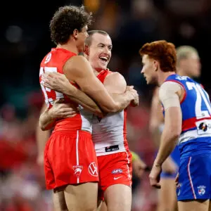 SYDNEY, AUSTRALIA - JULY 03: Charlie Curnow of the Swans celebrates kicking a goal with team mate Chad Warner during the round 17 AFL match between Sydney Swans and Western Bulldogs at Sydney Cricket Ground, on July 03, 2026, in Sydney, Australia. (Photo by Brendon Thorne/AFL Photos/via Getty Images)