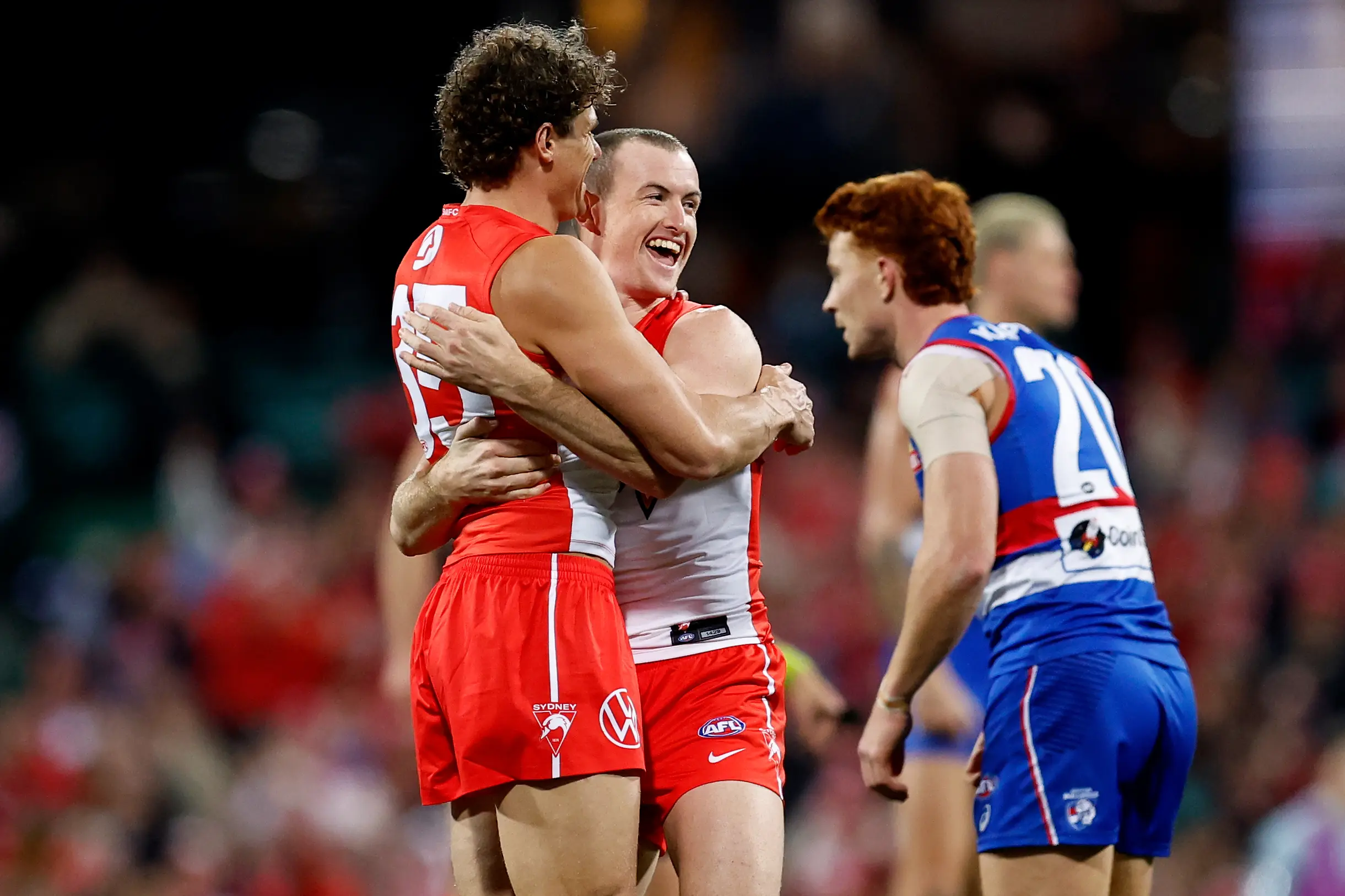 SYDNEY, AUSTRALIA - JULY 03: Charlie Curnow of the Swans celebrates kicking a goal with team mate Chad Warner during the round 17 AFL match between Sydney Swans and Western Bulldogs at Sydney Cricket Ground, on July 03, 2026, in Sydney, Australia. (Photo by Brendon Thorne/AFL Photos/via Getty Images)