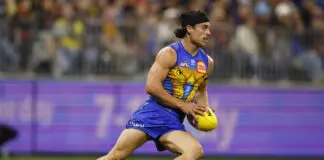 Carlton eyeing rival speedster: AFL trade news PERTH, AUSTRALIA - JULY 03: Marcus Herbert of the Eagles looks to dispose the ball during the round 17 AFL match between West Coast Eagles and Adelaide Crows at Optus Stadium, on July 03, 2026, in Perth, Australia. (Photo by James Worsfold/Getty Images)