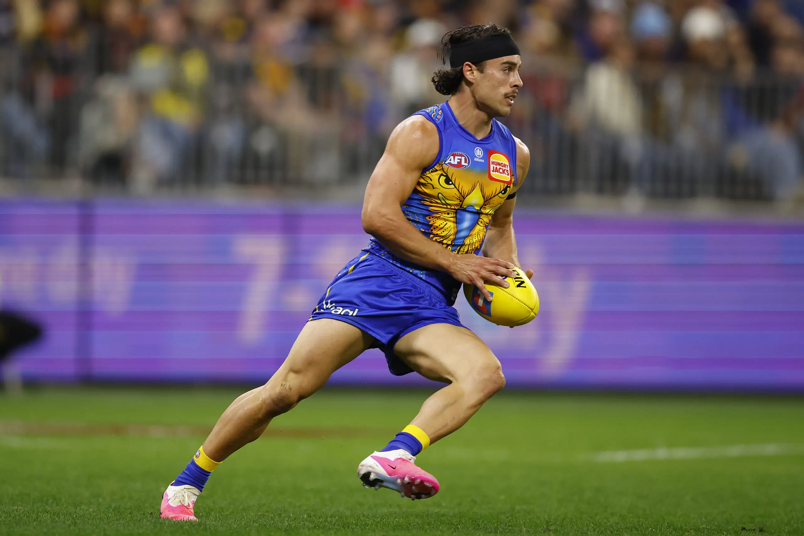 PERTH, AUSTRALIA - JULY 03: Marcus Herbert of the Eagles looks to dispose the ball during the round 17 AFL match between West Coast Eagles and Adelaide Crows at Optus Stadium, on July 03, 2026, in Perth, Australia. (Photo by James Worsfold/Getty Images)