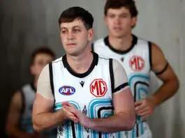 MELBOURNE, AUSTRALIA - JULY 11: Zak Butters of the Power leads his team out onto the field during the round 18 AFL match between St Kilda Saints and Port Adelaide Power at Marvel Stadium, on July 11, 2026, in Melbourne, Australia. (Photo by Josh Chadwick/AFL Photos/via Getty Images)