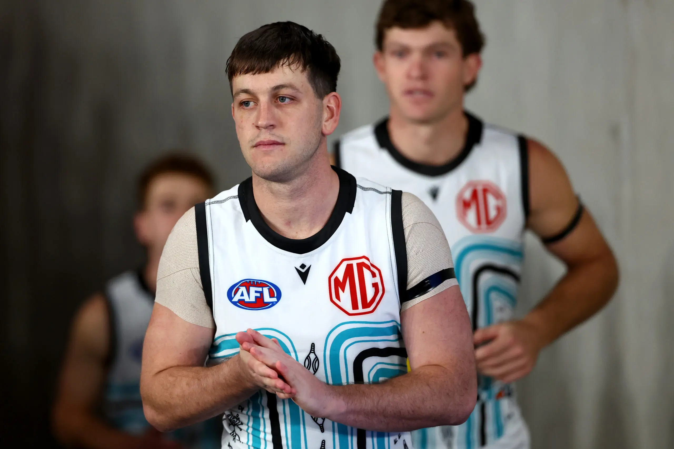 MELBOURNE, AUSTRALIA - JULY 11: Zak Butters of the Power leads his team out onto the field during the round 18 AFL match between St Kilda Saints and Port Adelaide Power at Marvel Stadium, on July 11, 2026, in Melbourne, Australia. (Photo by Josh Chadwick/AFL Photos/via Getty Images)