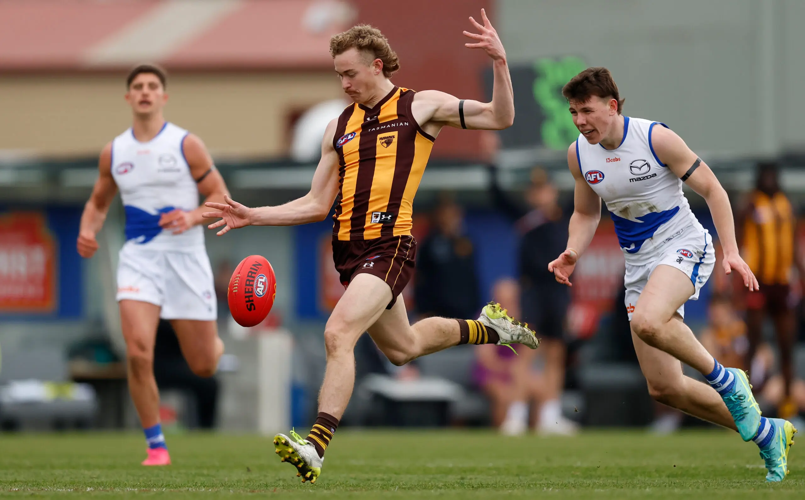 LAUNCESTON, AUSTRALIA - AUGUST 01: Bailey Macdonald of the Hawks kicks the ball during the 2026 AFL Round 21 match between the Hawthorn Hawks and the North Melbourne Kangaroos at UTAS Stadium on August 1, 2026 in Launceston, Australia. (Photo by Michael Willson/AFL Photos via Getty Images)