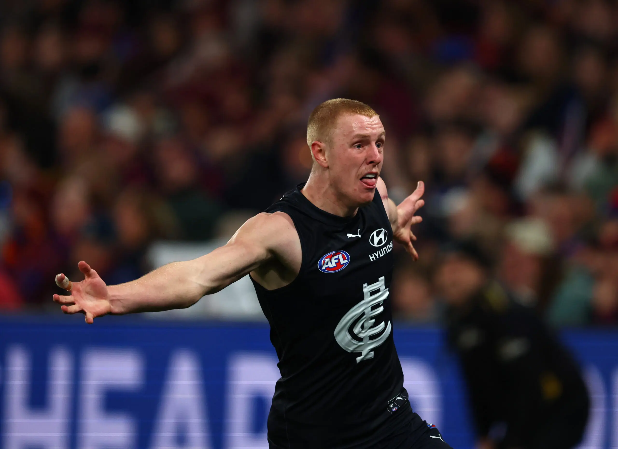 MELBOURNE, AUSTRALIA - AUGUST 01: Harry Dean of the Blues celebrates after scoring a goal during the round 21 AFL match between Carlton Blues and Brisbane Lions at Marvel Stadium, on August 01, 2026, in Melbourne, Australia. (Photo by Robert Cianflone/Getty Images)