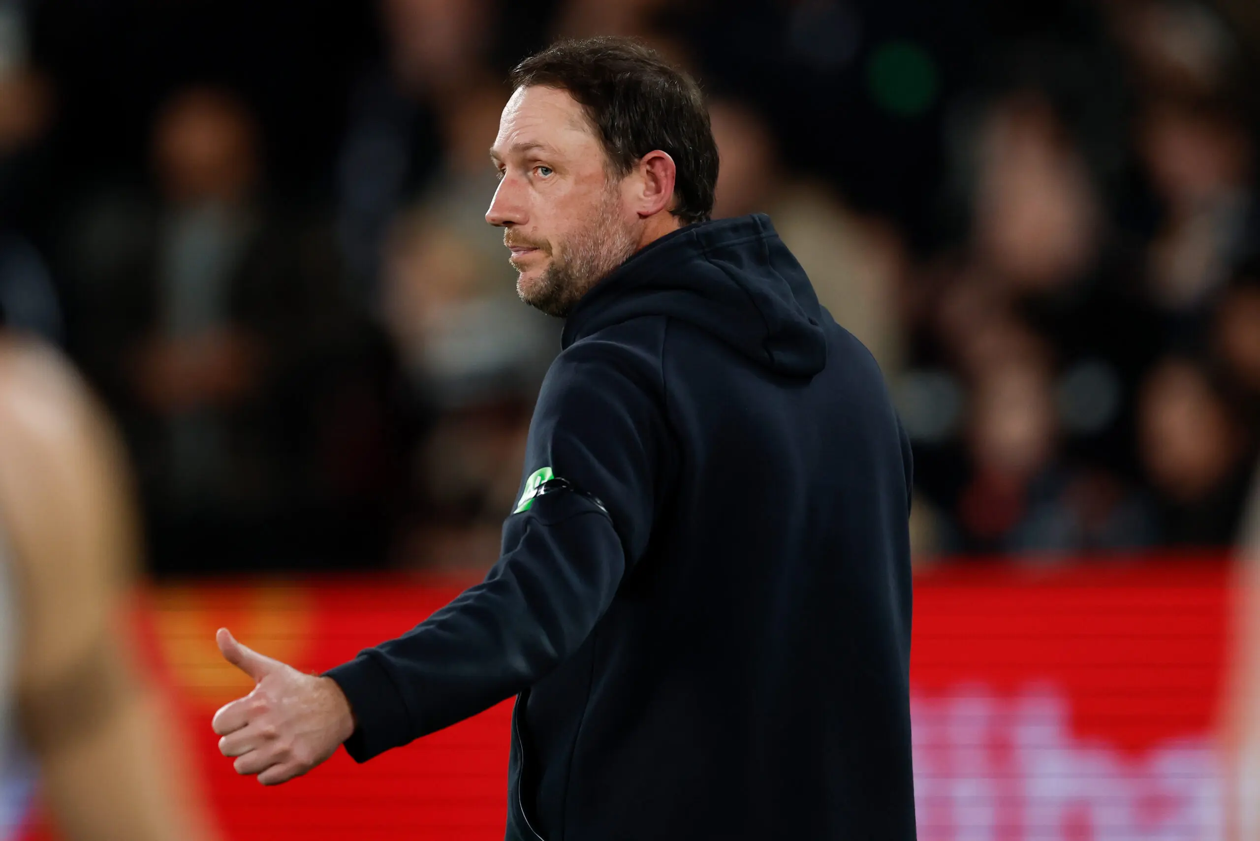 MELBOURNE, AUSTRALIA - AUGUST 09: Josh Fraser, Interim Senior Coach of the Blues gives the thumbs up during the 2026 AFL Round 22 match between the St Kilda Saints and the Carlton Blues at Marvel Stadium on August 9, 2026 in Melbourne, Australia. (Photo by Michael Willson/AFL Photos via Getty Images)