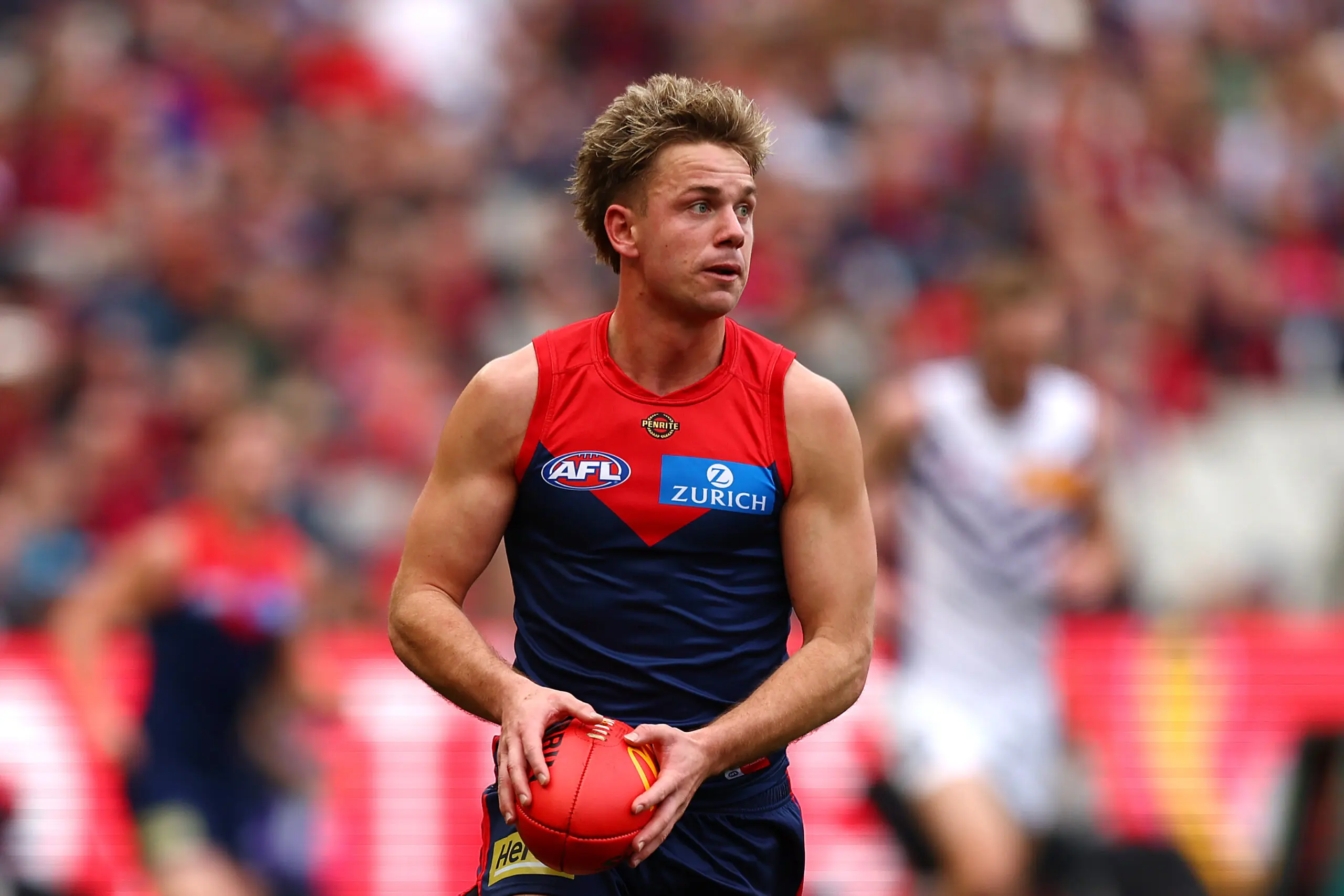 MELBOURNE, AUSTRALIA - AUGUST 08: Harry Sharp of the Demons in action during the round 22 AFL match between Melbourne Demons and Fremantle Dockers at Melbourne Cricket Ground on August 08, 2026 in Melbourne, Australia. (Photo by Graham Denholm/AFL Photos via Getty Images)