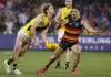 Richmond coach laments “moments” as signs of life go unrewarded for the young Tigers ADELAIDE, AUSTRALIA - AUGUST 08: Kye Annand of the Tigers is tackled by Izak Rankine of the Crows during the 2026 AFL Round 22 match between the Adelaide Crows and the Richmond Tigers at Adelaide Oval on August 8, 2026 in Adelaide, Australia. (Photo by James Elsby/AFL Photos via Getty Images)