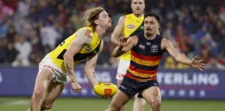 Richmond coach laments “moments” as signs of life go unrewarded for the young Tigers ADELAIDE, AUSTRALIA - AUGUST 08: Kye Annand of the Tigers is tackled by Izak Rankine of the Crows during the 2026 AFL Round 22 match between the Adelaide Crows and the Richmond Tigers at Adelaide Oval on August 8, 2026 in Adelaide, Australia. (Photo by James Elsby/AFL Photos via Getty Images)