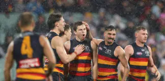 Unlikely hero stands tall as Adelaide Crows coach shoots down questions of “attitude” ADELAIDE, AUSTRALIA - AUGUST 08: Zac Taylor of the Crows celebrates a goal with team mates during the round 22 AFL match between Adelaide Crows and Richmond Tigers at Adelaide Oval, on August 08, 2026, in Adelaide, Australia. (Photo by Sarah Reed/AFL Photos/via Getty Images)