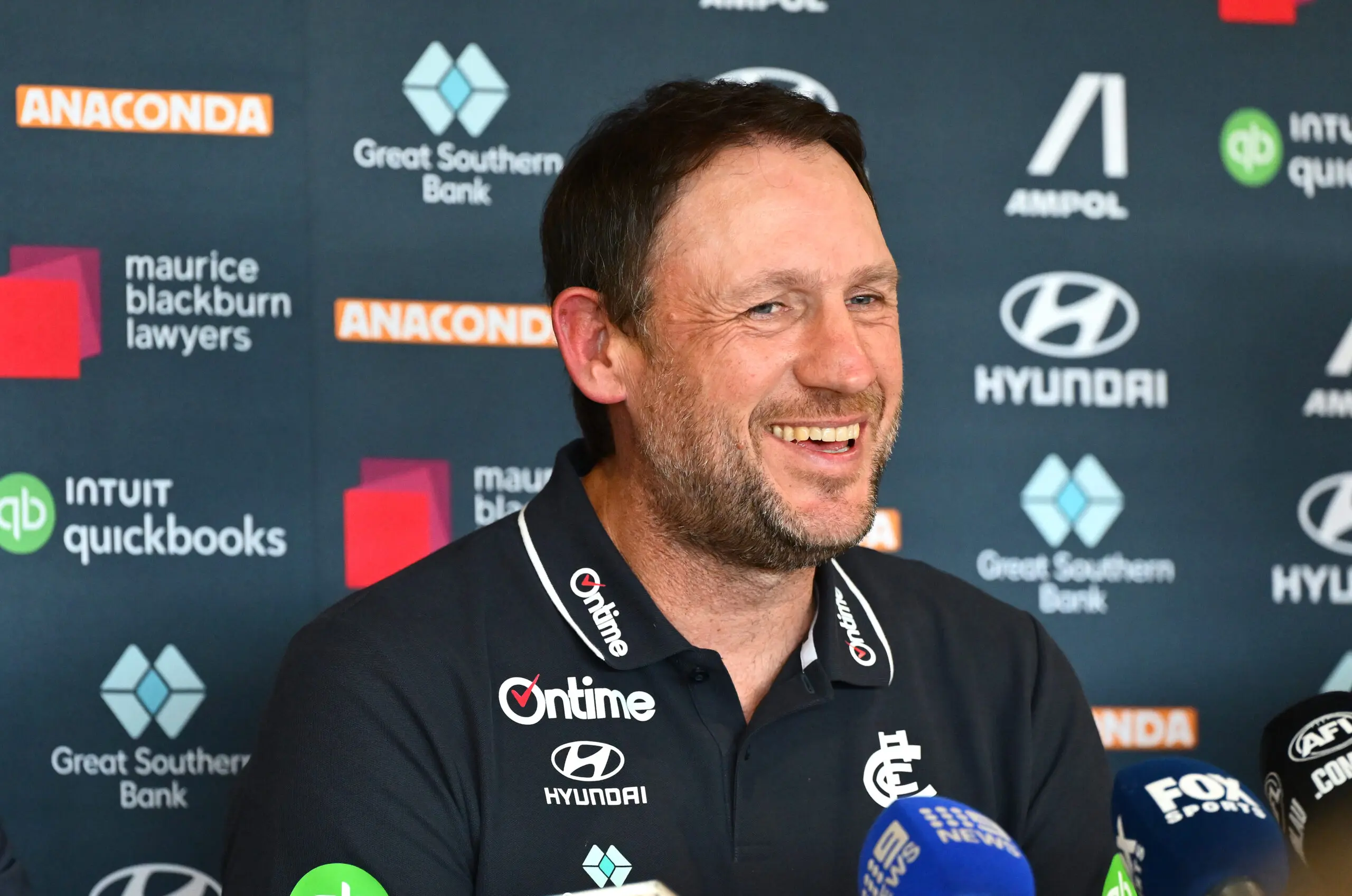 MELBOURNE, AUSTRALIA - AUGUST 18: New Carlton Senior Coach Josh Fraser speaks to the media during a Carlton Blues AFL press conference at Ikon Park on August 18, 2026 in Melbourne, Australia. (Photo by Quinn Rooney/Getty Images)