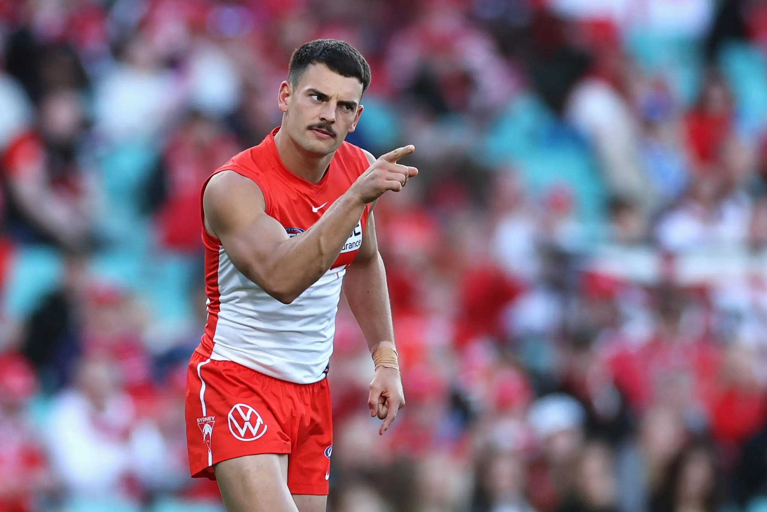 SYDNEY, AUSTRALIA - AUGUST 23: Billy Cootee of the Swans celebrates kicking a goal during the round 24 AFL match between Sydney Swans and North Melbourne Kangaroos at Sydney Cricket Ground, on August 23, 2026, in Sydney, Australia. (Photo by Cameron Spencer/Getty Images)