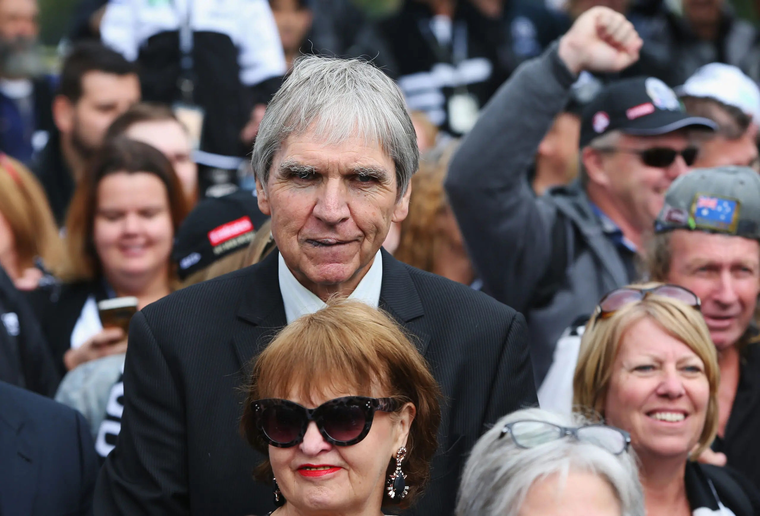 MELBOURNE, AUSTRALIA - MAY 06: Magpies legend Peter McKenna with Magpies fans as they march together for their 125 year celebrations during the round seven AFL match between the Collingwood Magpies and the Carlton Blues at Melbourne Cricket Ground on May 6, 2017 in Melbourne, Australia. (Photo by Michael Dodge/Getty Images)