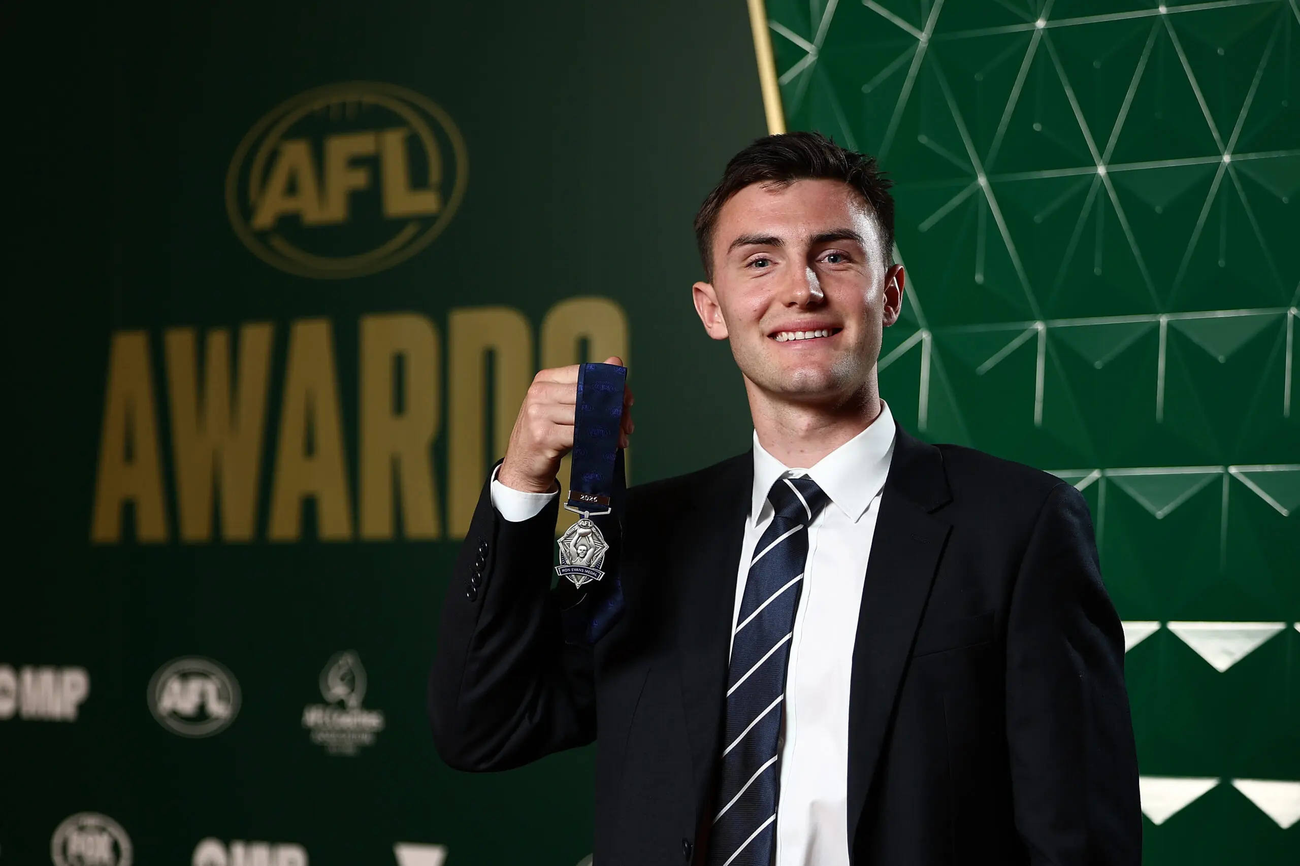 MELBOURNE, AUSTRALIA - AUGUST 25: Jagga Smith of the Blues poses after being presented with the Telstra AFL Rising Star award during the 2026 AFL Awards at Centrepiece on August 25, 2026 in Melbourne, Australia. (Photo by James Wiltshire/AFL Photos)