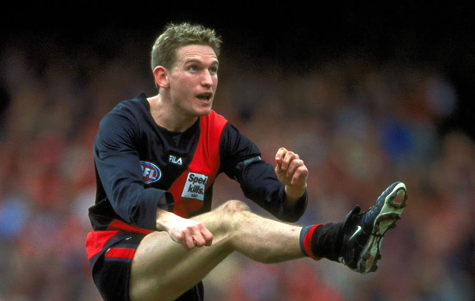 2 Sep 2000: James Hird #5 for Essendon kicks for goal, in the AFL Grand Final match between the Essendon Bombers and the Melbourne Demons, played at the Melbourne Cricket Ground in Melbourne, Australia. Mandatory Credit: Hamish Blair/ALLSPORT