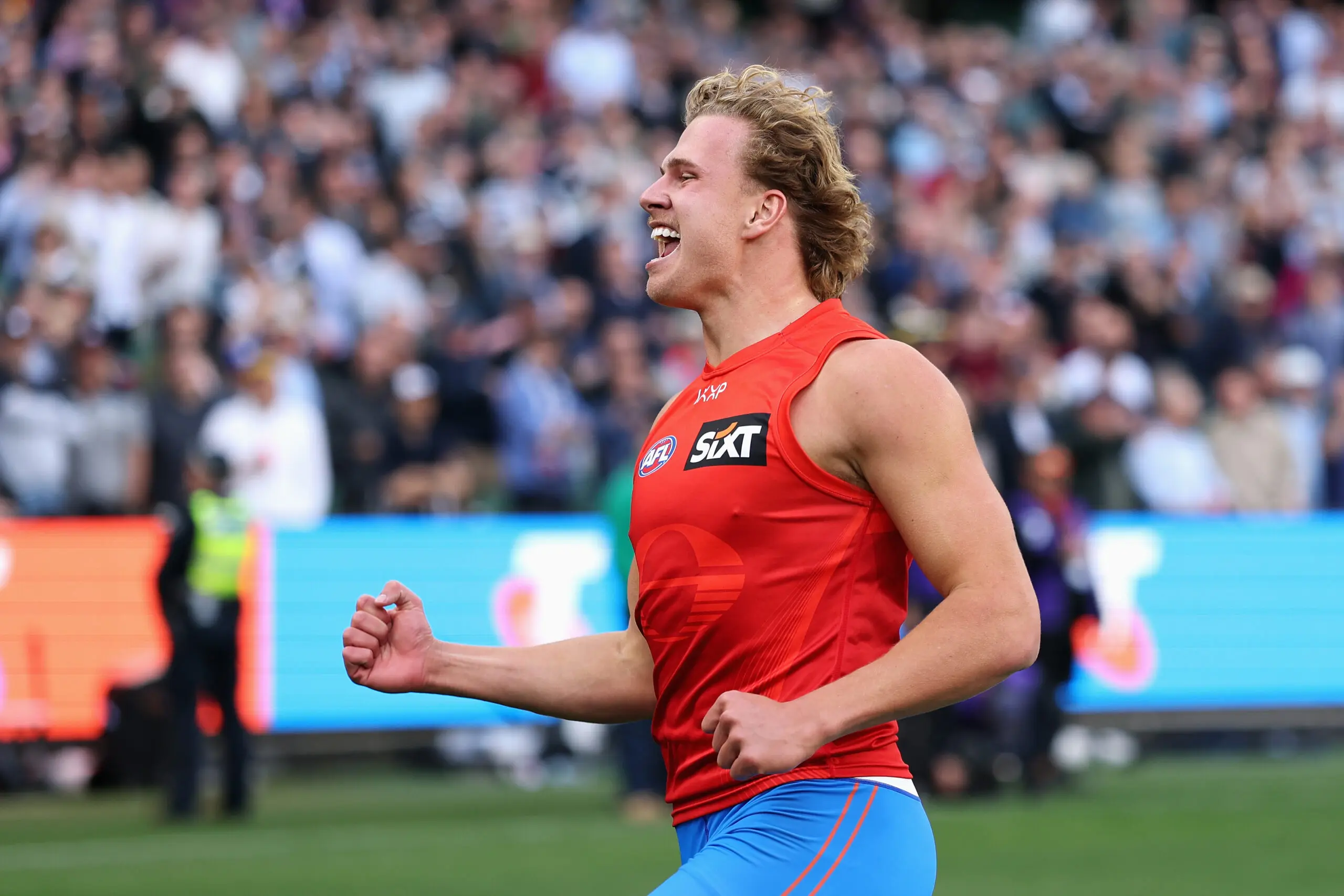MELBOURNE, AUSTRALIA - SEPTEMBER 27: Jed Walter of the Suns wins the 'Half-time Sprint' during the AFL Grand Final match between Geelong Cats and Brisbane Lions at Melbourne Cricket Ground on September 27, 2025 in Melbourne, Australia. (Photo by Cameron Spencer/AFL Photos/via Getty Images)