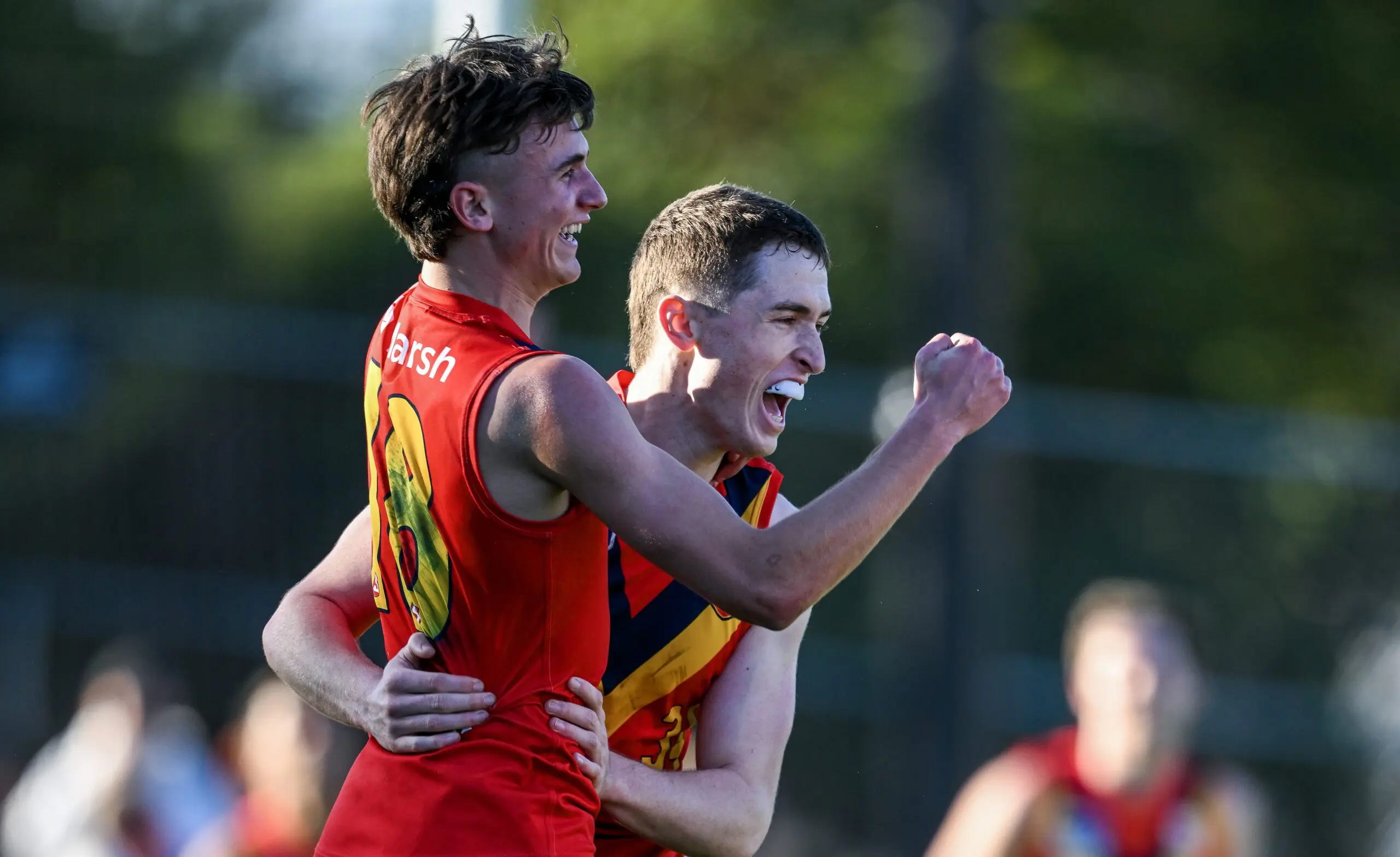 ADELAIDE, AUSTRALIA - JUNE 21: Jack Slattery of South Australia celebrates a goal after the final siren withj Harvey Croker of South Australia during the Marsh AFL National Championships U18 Boys match between South Australia and Allies at Alberton Oval on June 21, 2026 in Adelaide, Australia. (Photo by Mark Brake/AFL Photos/via Getty Images)