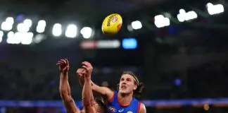 Western Bulldogs confirm two re-signings of emerging AFL prospects MELBOURNE, AUSTRALIA - JULY 25: Dion Prestia of the Tigers and Jedd Busslinger of the Bulldogs compete for the ball during the round 20 AFL match between Western Bulldogs and Richmond Tigers at Marvel Stadium, on July 25, 2026, in Melbourne, Australia. (Photo by Morgan Hancock/Getty Images)