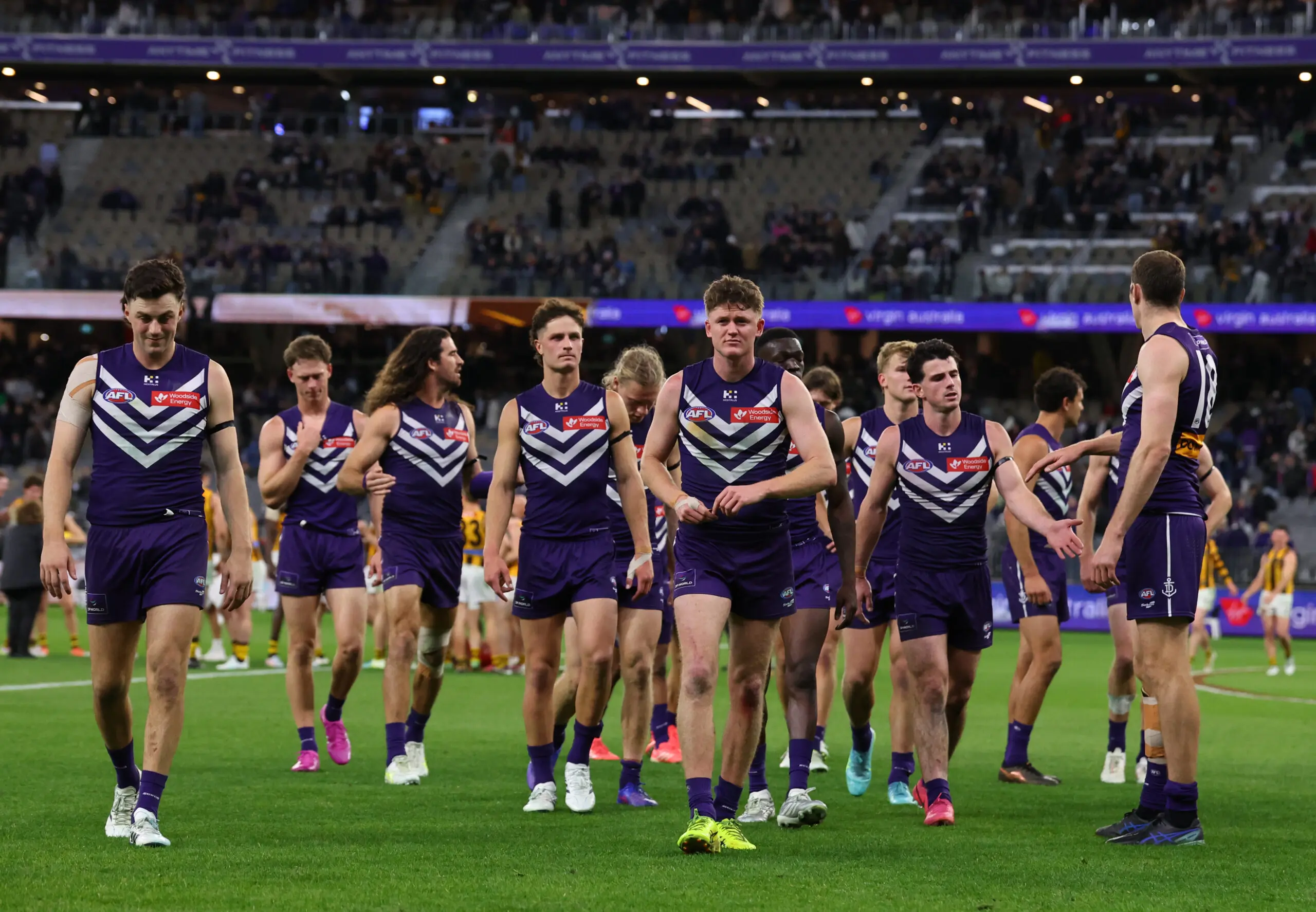 PERTH, AUSTRALIA - SEPTEMBER 03: The Dockers walk off after they were defeated by the Hawks during the AFL Qualifying Final match between Fremantle Dockers and Hawthorn Hawks at Optus Stadium, on September 03, 2026, in Perth, Australia. (Photo by Paul Kane/Getty Images)