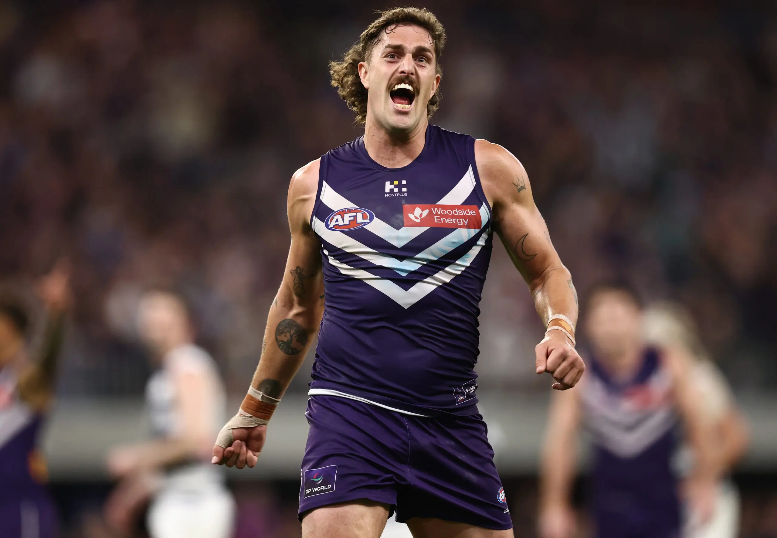 PERTH, AUSTRALIA - SEPTEMBER 11: Luke Jackson of the Dockers celebrates a goal during the 2026 AFL First Semi Final between the Fremantle Dockers and the Geelong Cats at Optus Stadium on September 11, 2026 in Perth, Australia. (Photo by James Wiltshire/AFL Photos via Getty Images)