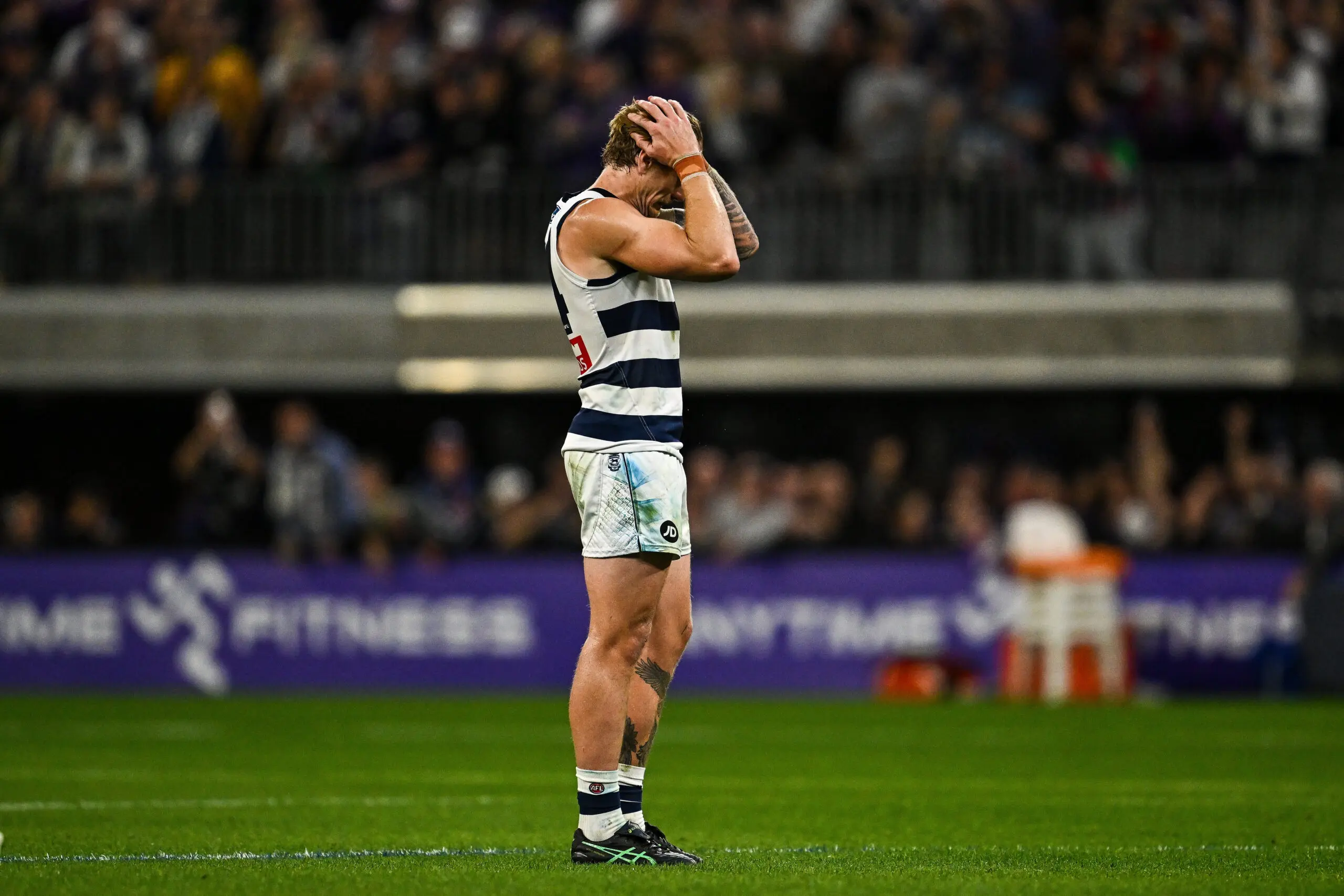PERTH, AUSTRALIA - SEPTEMBER 11: Tom Stewart of the Cats reacted to loosing on the final siren during the 2026 AFL First Semi Final between the Fremantle Dockers and the Geelong Cats at Optus Stadium on September 11, 2026 in Perth, Australia. (Photo by Daniel Carson/AFL Photos via Getty Images)