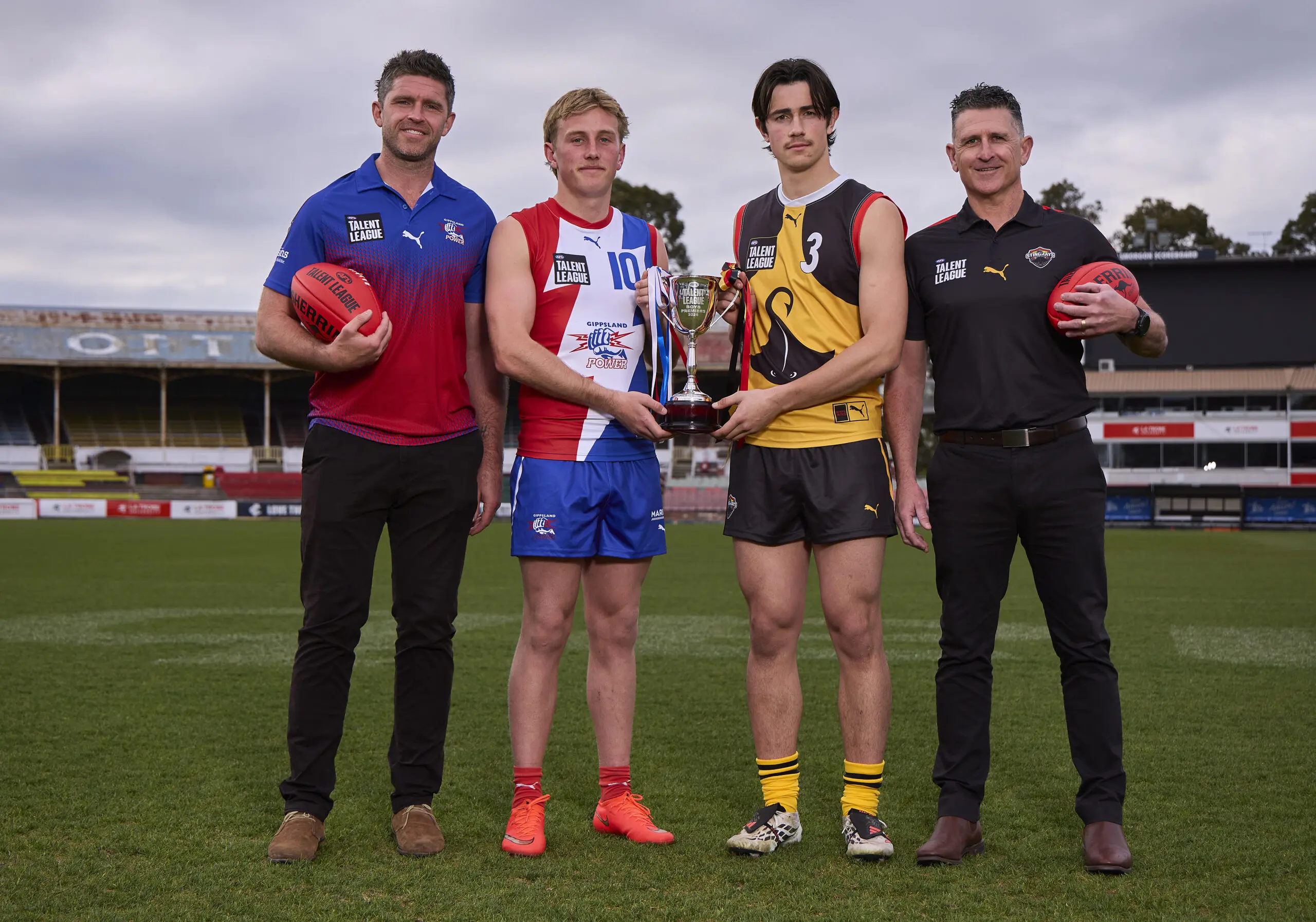 MELBOURNE, AUSTRALIA - SEPTEMBER 14: (L-R) Gippsland Power Senior Coach Kris Pendlebury, Cody Templeton of Gippsland Power, Gus Kennedy of the Dandenong Stingrays and Dandenong Stingrays Senior Coach Nick Cox pose during the 2026 AFL Talent League Grand Final Media Opportunity at Ikon Park on September 14, 2026 in Melbourne, Australia. (Photo by Graham Denholm/AFL Photos via Getty Images)