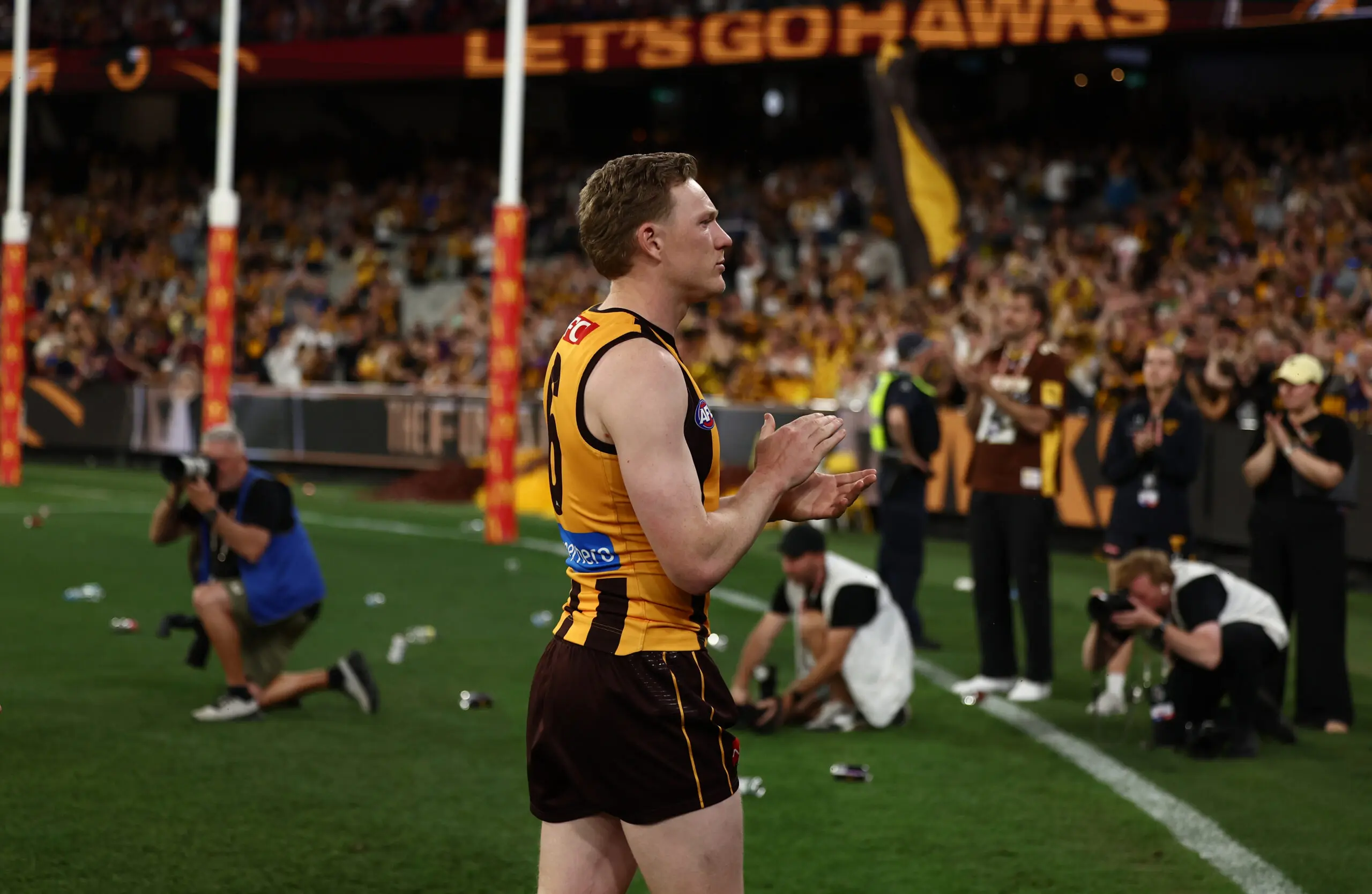 MELBOURNE, AUSTRALIA - SEPTEMBER 19: James Sicily of the Hawks leads the team off during the 2026 AFL First Preliminary Final between the Hawthorn Hawks and the Brisbane Lions at the Melbourne Cricket Ground on September 19, 2026 in Melbourne, Australia. (Photo by James Wiltshire/AFL Photos via Getty Images)