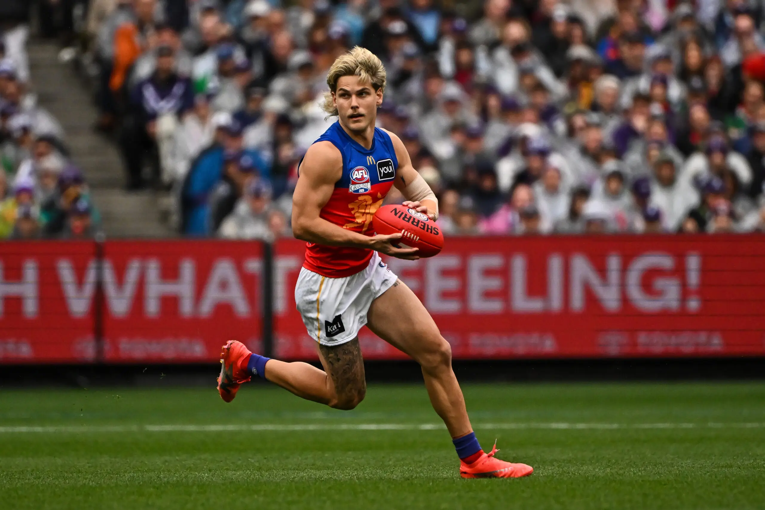 MELBOURNE, AUSTRALIA - SEPTEMBER 26: Will Ashcroft of the Lions runs with the ball during the AFL Grand Final match between the Fremantle Dockers and the Brisbane Lions at the Melbourne Cricket Ground on September 26, 2026 in Melbourne, Australia. (Photo by Daniel Carson/AFL Photos via Getty Images)