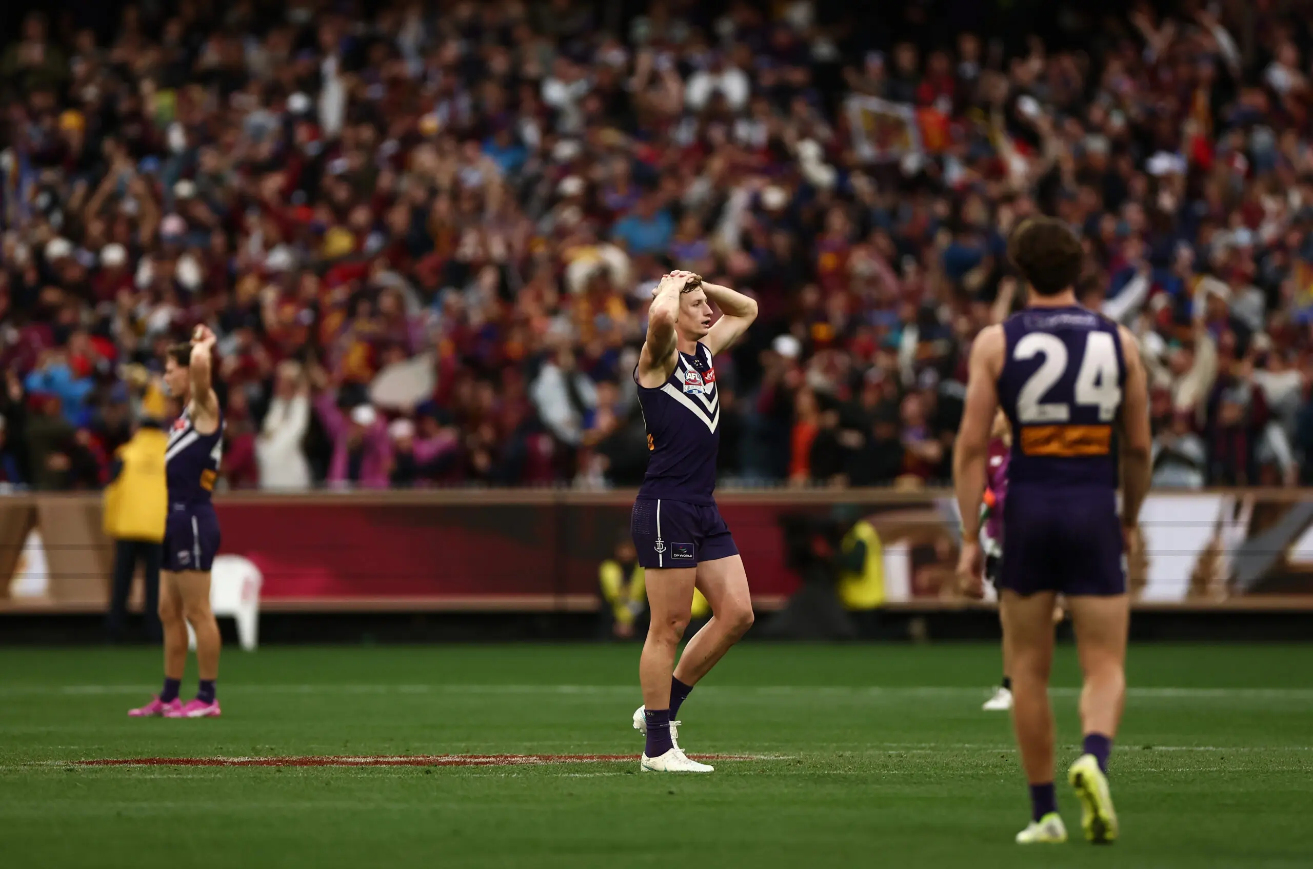MELBOURNE, AUSTRALIA - SEPTEMBER 26: Josh Treacy of the Dockers is disappointed after a Brisbane goal during the AFL Grand Final match between the Fremantle Dockers and the Brisbane Lions at the Melbourne Cricket Ground on September 26, 2026 in Melbourne, Australia. (Photo by James Wiltshire/AFL Photos via Getty Images)