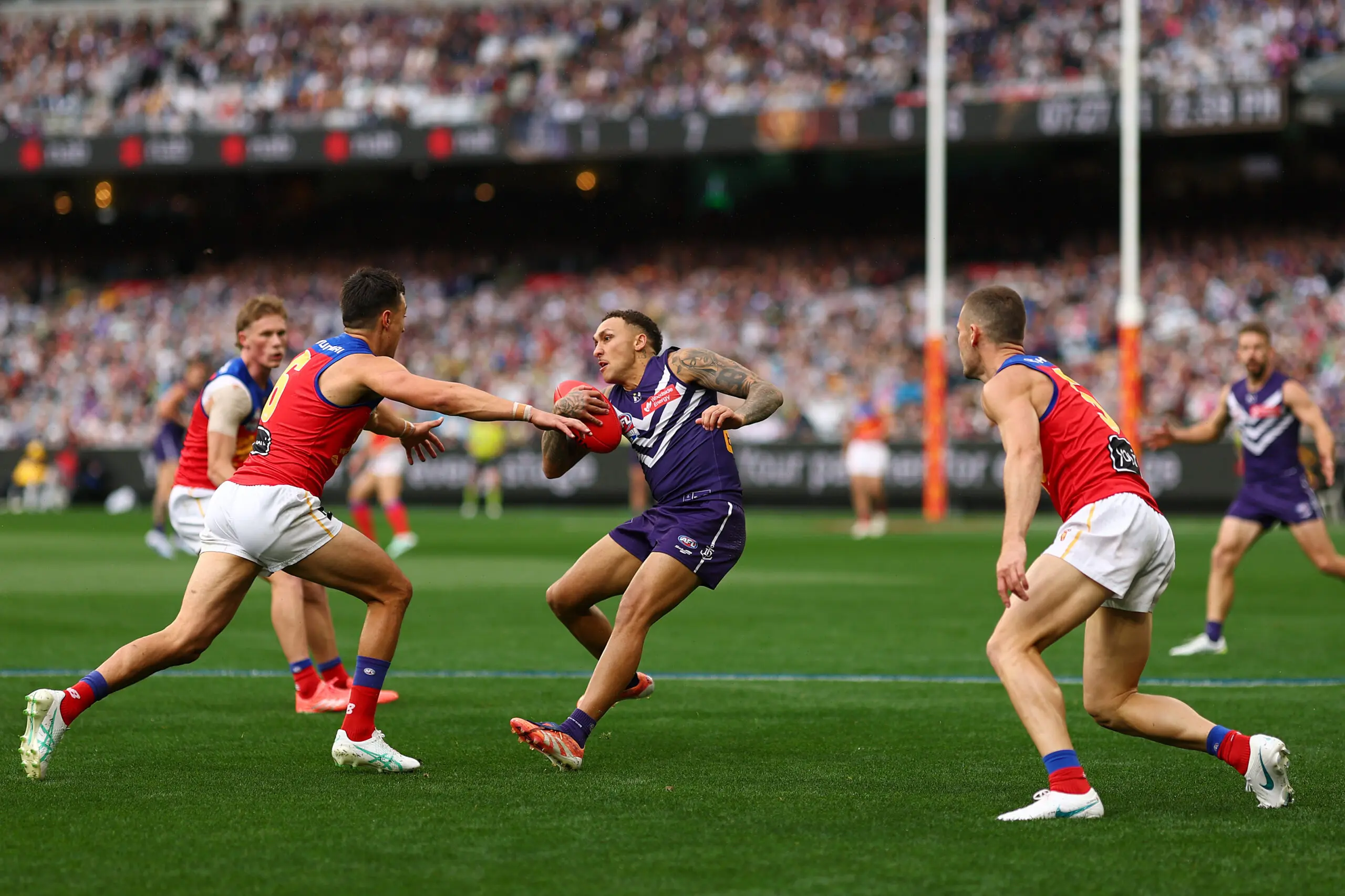 MELBOURNE, AUSTRALIA - SEPTEMBER 26: Shai Bolton of the Dockers runs with the ball during the AFL Grand Final match between Fremantle Dockers and Brisbane Lions at Melbourne Cricket Ground, on September 26, 2026, in Melbourne, Australia. (Photo by Morgan Hancock/AFL Photos/via Getty Images)