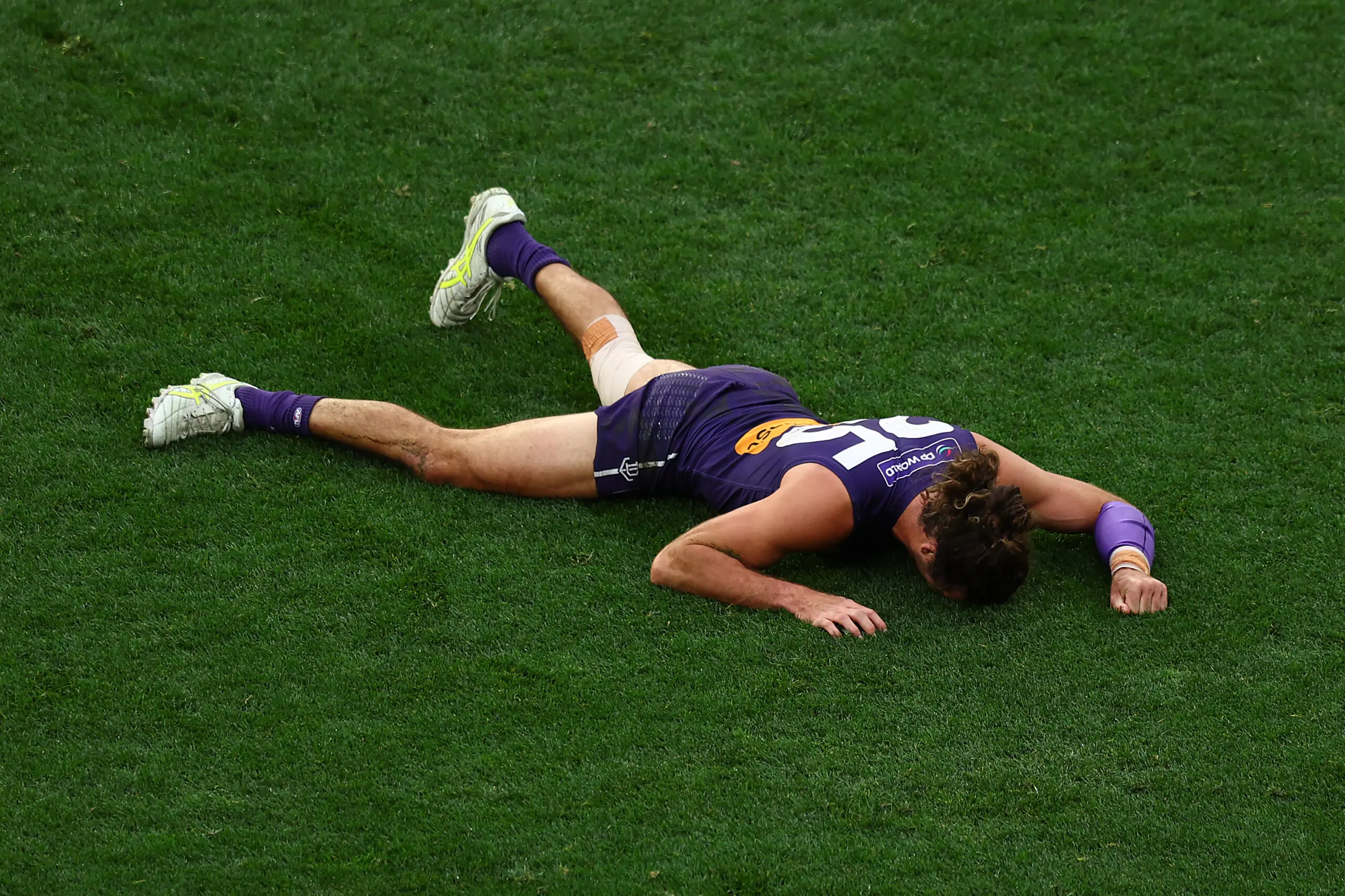 MELBOURNE, AUSTRALIA - SEPTEMBER 26: Alex Pearce of the Dockers reactsduring the AFL Grand Final match between Fremantle Dockers and Brisbane Lions at Melbourne Cricket Ground on September 26, 2026 in Melbourne, Australia. (Photo by Graham Denholm/AFL Photos via Getty Images)
